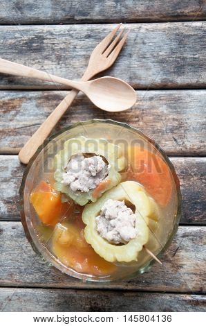 Boiled gourd stuffed with minced pork in glass bowl