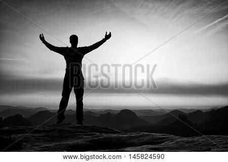 Happy Man With Open Raised Arms Gesture Of Triumph. Satisfy Hiker  Silhouette