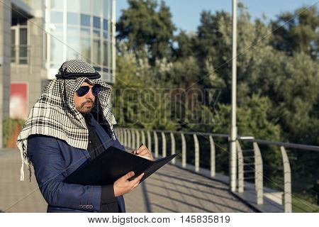 Oriental young businessman in the modern city