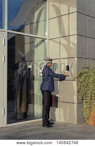 Oriental young businessman in the modern city