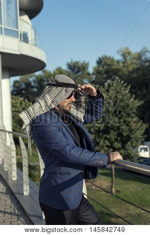 Oriental young businessman in the modern city