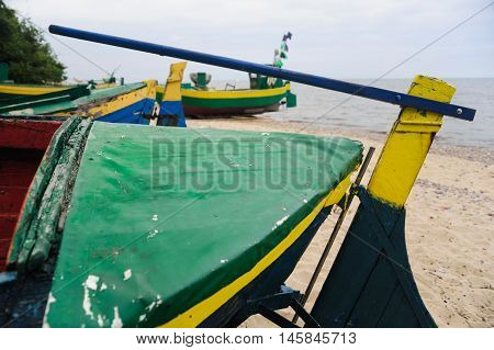 Old wooden fishing boats on the shore of Baltic sea