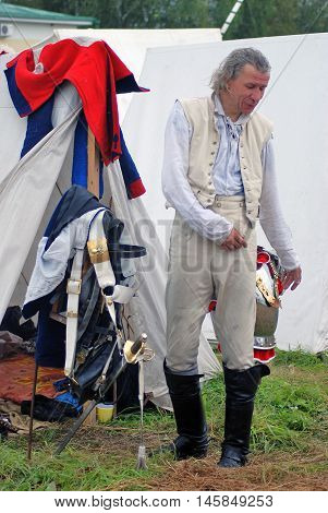 BORODINO MOSCOW REGION - SEPTEMBER 04 2016: Reenactor dressed as Napoleonic war soldier at Borodino battle historical reenactment in Russia. Color photo.