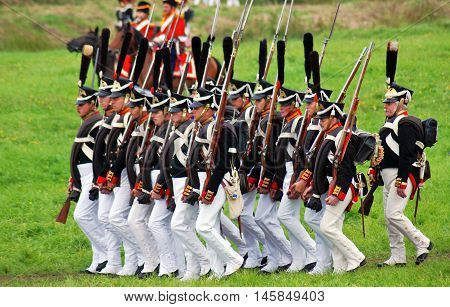 BORODINO MOSCOW REGION - SEPTEMBER 04 2016: Reenactors dressed as Napoleonic war soldiers at Borodino battle historical reenactment in Russia. Color photo.