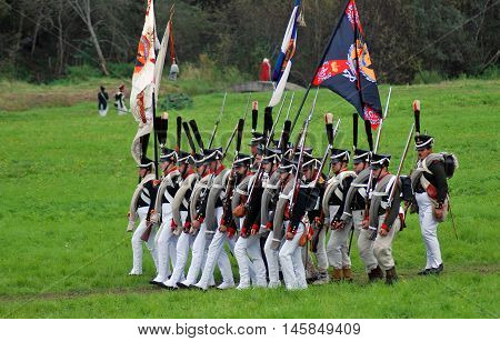 BORODINO MOSCOW REGION - SEPTEMBER 04 2016: Reenactors dressed as Napoleonic war soldiers at Borodino battle historical reenactment in Russia. Color photo.