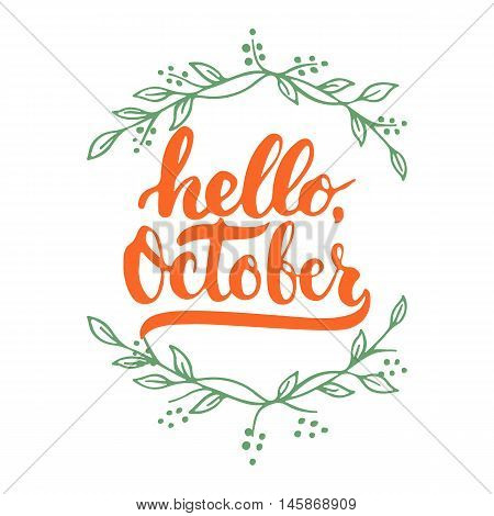 Hand drawn typography lettering phrase Hello, October isolated on the white background with wreath. Fun brush ink inscription for photo overlays, greeting and invitation card or t-shirt print design.
