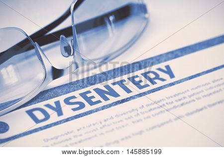 Diagnosis - Dysentery. Medicine Concept with Blurred Text and Eyeglasses on Blue Background. Selective Focus. 3D Rendering.
