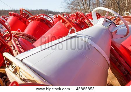 red and white buoys. unnavigable period. buoys on the shore in the winter. Closeup