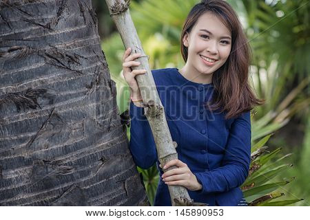 Thai Farmer Woman Wearing Typical Thai Dress, On Rice Fields Background, Identity Culture Of Thailan