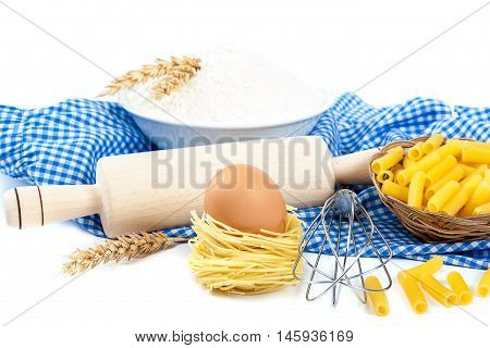 Kitchen utensils eggs and flour for baking isolated on white background.