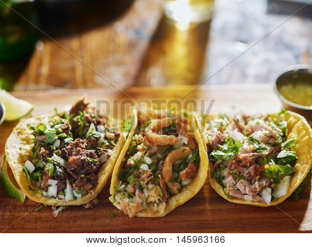 chopped pork, barbacoa and ChicharrÃ?ÃÂ³n tacos