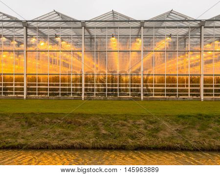 Abstract background of a commercial glasshouse with light
