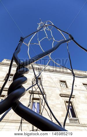 Barcelona Spain - February 16 2012: Castellers human tower modern statue at Placa de Sant Miquel