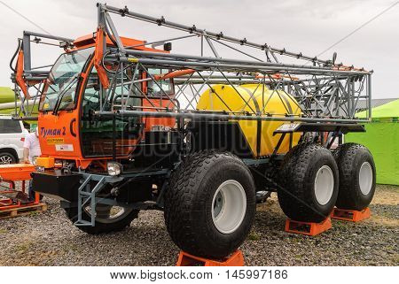 Tyumen, Russia - June 24, 2016: The 5th open championship of Russia on plowed land. Sprayer spreader self-propelled Tuman-2 for entering of fertilizer in liquid and granulated form