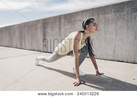 Zealous Athletic Girl Prepared To Run A Long Distance Outdoors