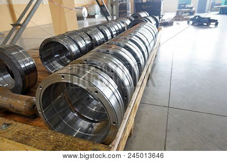 Cylindrical Metal Parts After Processing On The Rack