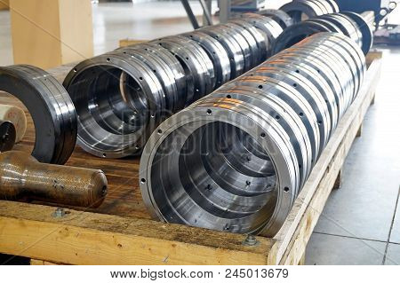 Cylindrical Metal Parts After Processing On The Rack