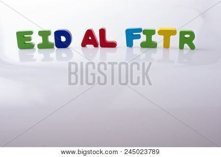 The Word Eid El Fitr  Written With Colorful Letter Blocks
