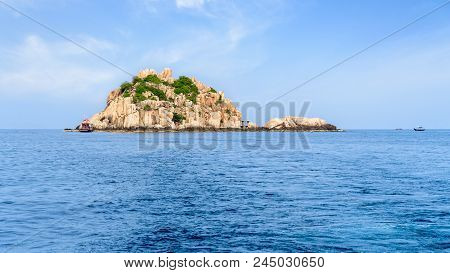 Beautiful Nature Landscape Of Shark Island Divesite On The Blue Sea, Small Rock Island At Ko Tao Dur
