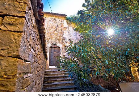 Groznjan Cobbled Street And Old Architecture At Sunset View, Istria Region Of Croatia