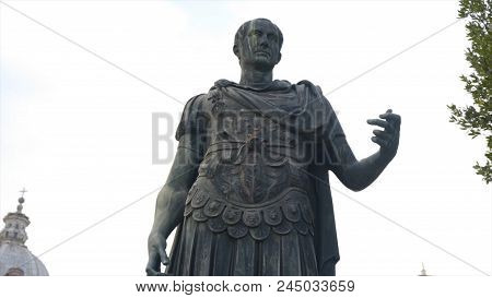 Antique Monument In Europe. Antique Sculpture In One Of The Europe City. Ancient Famous Statue.
