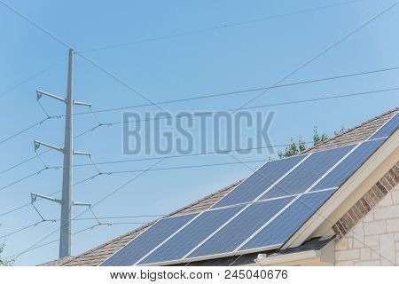 Solar Panel Installation On Asphalt Shingles Rooftop