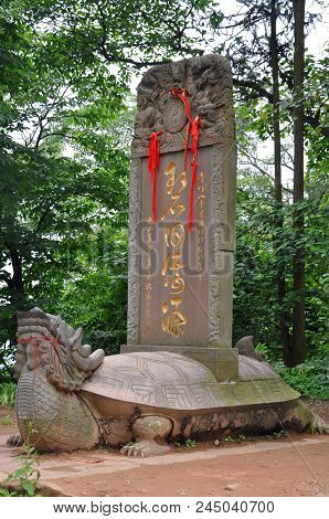 Mount Qingcheng, Sichuan, China - Jun. 21, 2012: Tablet Mounted On A Stone Tortoise On Mount Qingche