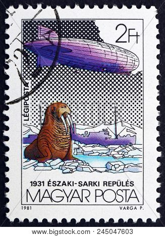 Hungary - Circa 1981: A Stamp Printed In Hungary Shows Graf Zeppelin Over Icebreaker Malygin, Polar 
