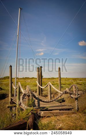 Small Wooden Pontoon Abobe A Dried Up River
