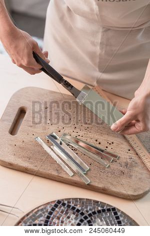 Workplace Of The Mosaic Master: Women's Hands Holding Tool For Mosaic Details In The Process Of Maki