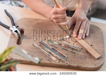 Workplace Of The Mosaic Master: Women's Hands Holding Tool For Mosaic Details In The Process Of Maki