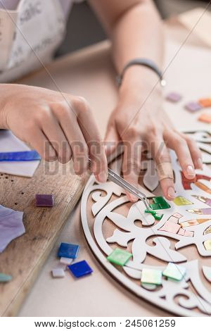 Workplace Of The Mosaic Master: Women's Hands Holding Tool For Mosaic Details In The Process Of Maki