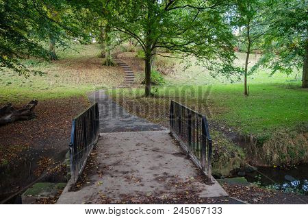 A Pathway And Bridge In Autumn In Backhouse Park, Sunderland