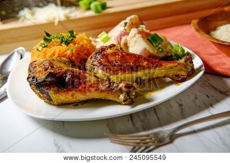 Colombian Cuisine Papas Chorreadas Roasted Chicken Legs And