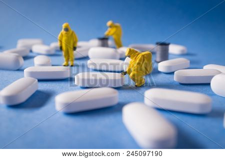Miniature Hazmat Team Inspects Hazardous Pain Killer Pills