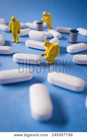 Miniature Hazmat Team Inspects Hazardous Pain Killer Pills