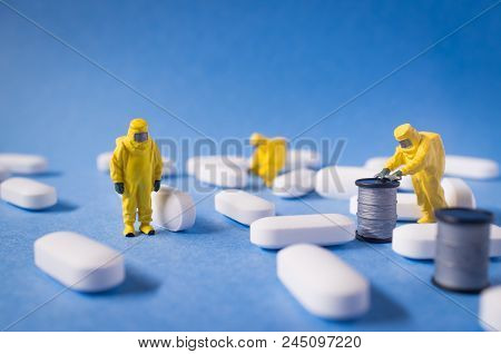 Miniature Hazmat Team Inspects Hazardous Pain Killer Pills