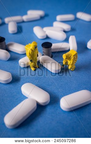 Miniature Hazmat Team Inspects Hazardous Pain Killer Pills