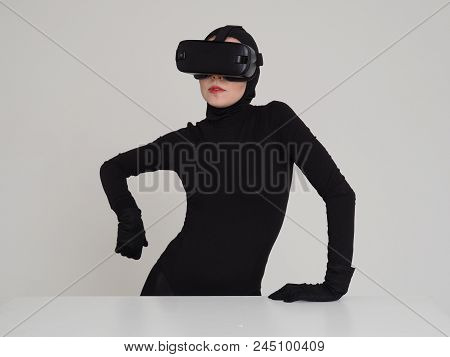 An Excited Woman Experiencing The Virtual Reality Helmet. Hi-tech Gadgets For Geeks And Technical En