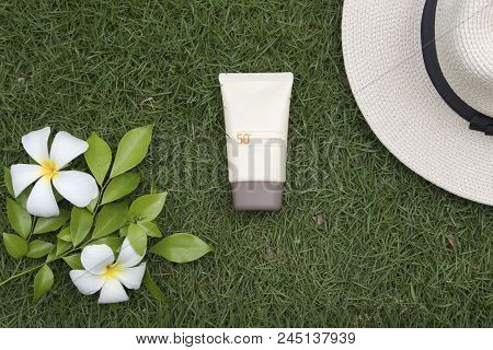 Natural Cosmetic For Skin Face Sunscreen Spf50 And Hat Of Lifestyle Woman Relax Summer With Frangipa