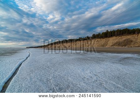 Spring Landscape. Melting Snow On The Ob Reservoir. Russia, Siberia, The Novosibirsk Region.