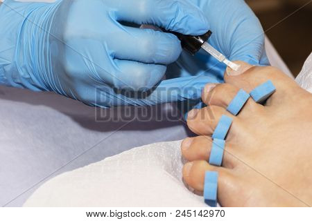 Woman Feet Receiving Pedicure. Close Up Concept