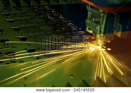 Close-up Of The Fiber Laser Cutting Machine Cutting The Sheet Metal Plate.