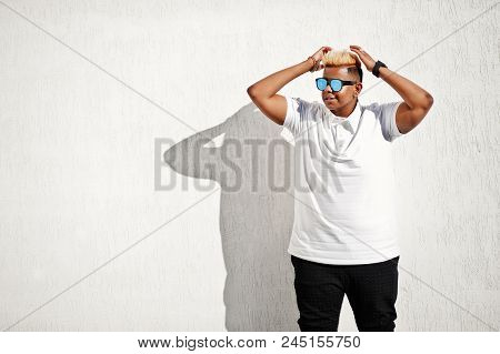 Stylish Arabian Muslim Boy With Originally Hair And Sunglasses Posed On Streets At Roof Against Whit