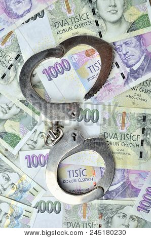 Corruption - Police Handcuffs On Czech Banknotes, Czech Crown Money Czk - The Concept Of Finance And