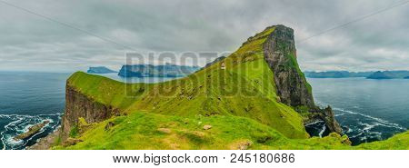 Shot Of Beautiful Panoramic Scene, Kalsoy Island and Kallur lighthouse, Faroe Islands