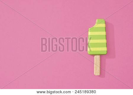 Ice Cream Popsicles Lollipops On A Pastel Pink Background Ready For Summer.   Wooden Toy Ice Lolly