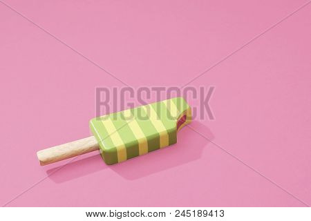 Ice Cream Popsicles Lollipops On A Pastel Pink Background Ready For Summer.   Wooden Toy Ice Lolly