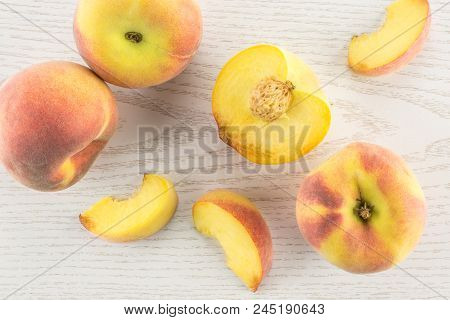 Yellow Peaches Flatlay Collection On Grey Wood Background
