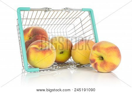 Yellow Ripe Peaches In A Shopping Basket Isolated On White Background